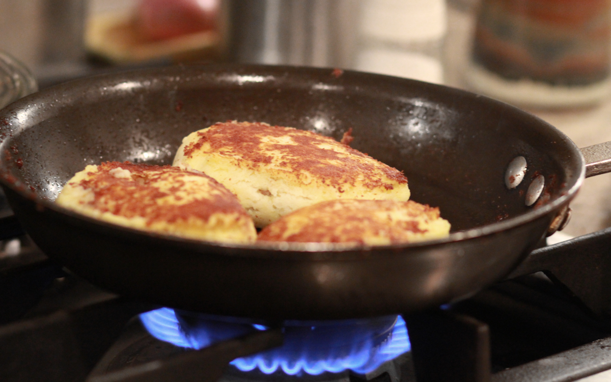 potato pancakes in a frying pan